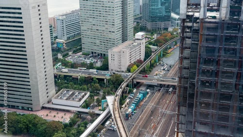 Ginza, Tokyo, Japan- November 6, 2019: 4K time lapse video of Birdseye view Ginza main roads in the city traffic During rush time lots of cars on the road. photo