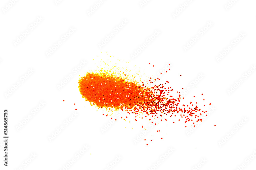 Orange glitter powder and sand color splash or burst isolated on white