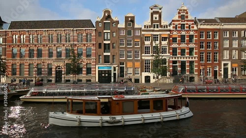 Typical Dutch Houses At Rokin Canal In Amsterdam, Netherlands