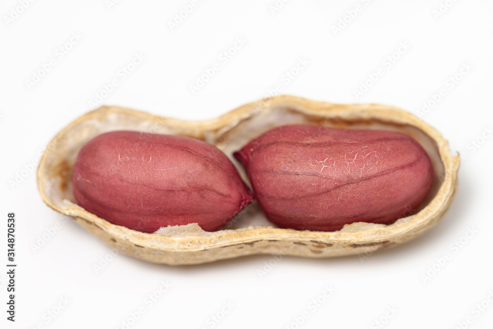 Peanuts in the shell two nuts macro isolated white background Peanuts in the shell two nuts macro isolated white background