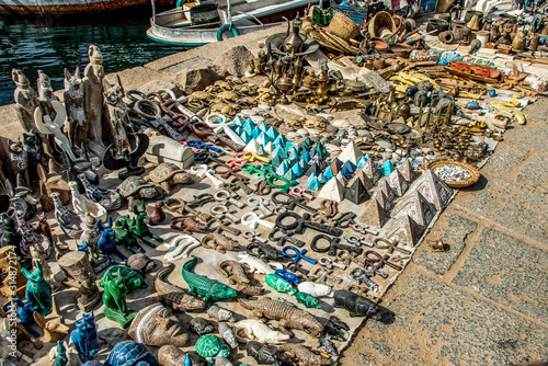 Egyptian Souvenier stand at Marina Philae EGYPT 20.05.2018 Tourists boat harbour to Philea temple UNESCO heritage photo