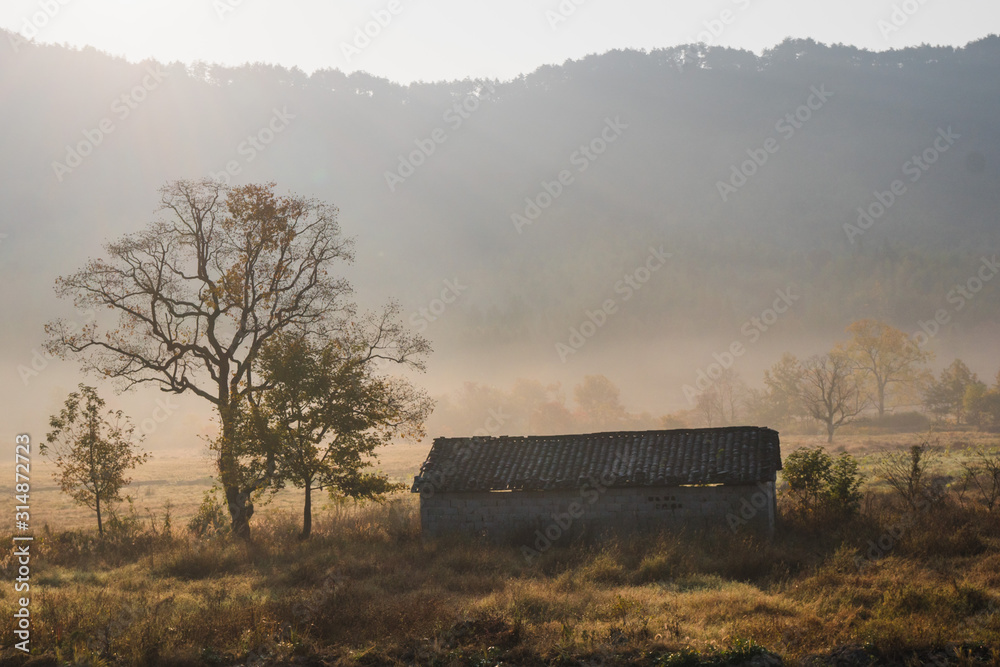 Fototapeta premium Picturesque autumn morning in the countryside in Huanghan region, close to Hongcun and Tachuan villages in China, Yi County