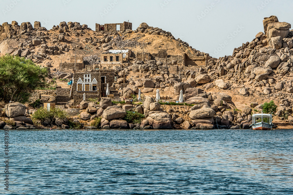Marina Philae EGYPT 20.05.2018 - Solaih Nubian Restaurant and Guest House Philae lake with Tourists boats