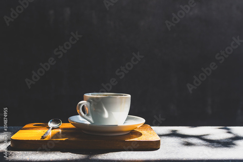Coffee Cup on table Cafe shop Interior with Blur background