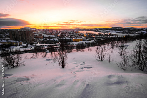 Murmansk  Russia - January  5  2020  landscape with the .image of Murmansk  the largest city in the Arctic  during the polar night