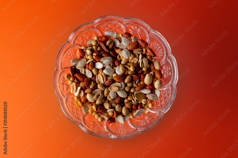 Top shot of a dry fruits in a colorful environment Top shot of a dry fruits in a colorful environment