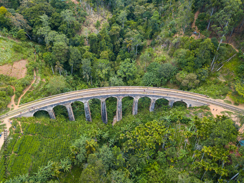 Aerial view of Nine Arch Bridge a very picturesque spot in Ella, Sri Lanka. Ella is a mountain town in the Central Highland of Sri Lanka surrounded by the beautiful greens of tea. © boyloso