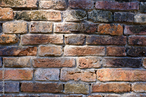 old red brick wall with light for background