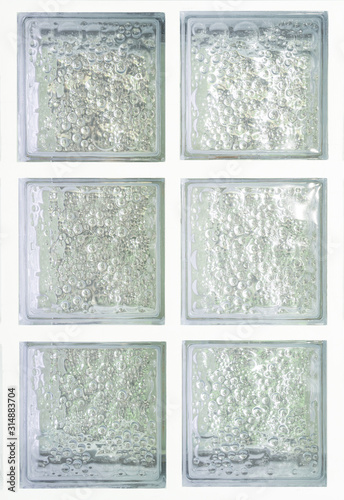 Clear transparent square bathroom glass block cube stall panel and have rough circle bubble and illustration pattern texture .Use for object and materials. Array in six grids vertical line.