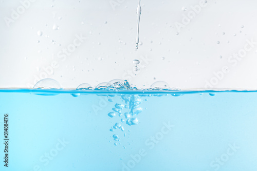 Water splash and ripple isolated on white background.