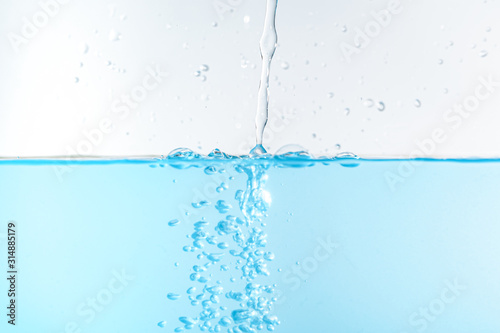 Water splash and ripple isolated on white background.