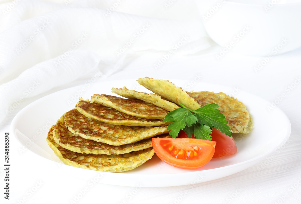 Vegetarian pancake with spinach, parsley and tomato Vegetarian pancake with spinach, parsley and tomato