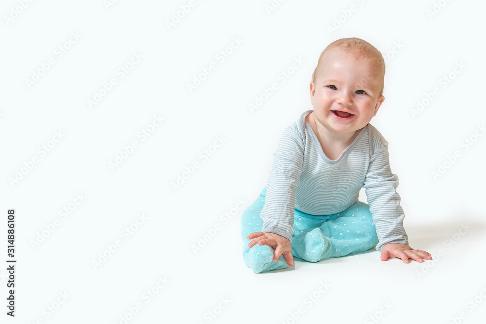 Portrait of smiling cute baby boy sitting on the white background Portrait of smiling cute baby boy sitting on the white background