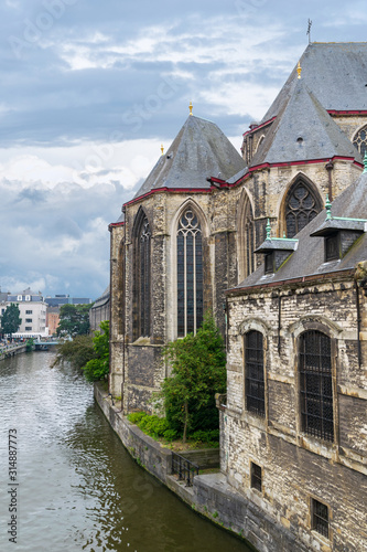 St. Michael's Church in Belgian Ghent under a cloudy sky