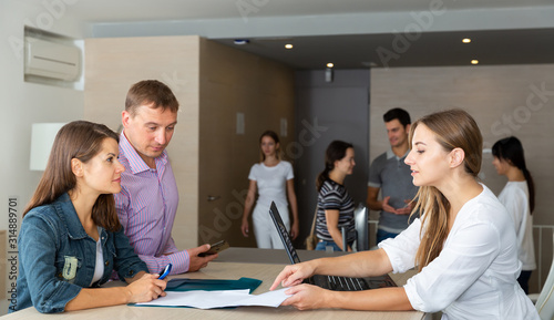 Female employee of staffing agency consulting clients