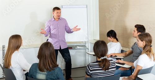 Male manager making presentation