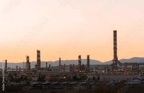Petrochemical plant, Oil and gas refinery at twilight.Suitable for Environment protection and sustainability.