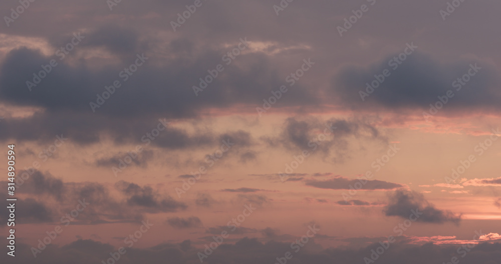 summer sunset skyscape with moving clouds