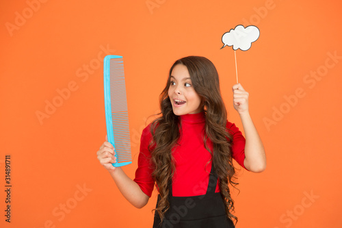 Communication. Inspiration creating hairstyle. Idea for hair. Get rid of annoying tangles. Girl long hair hold comb and speech bubble. Hairdresser salon. Combing hair. Styling tips. Tangled hair