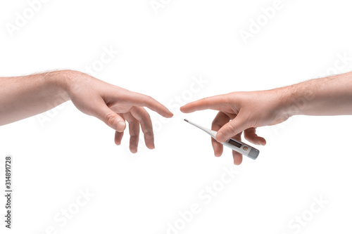 Two male hands passing one another medical electronic thermometer on white background (ID: 314891728)