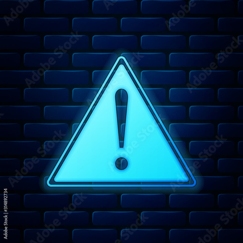 Glowing neon Exclamation mark in triangle icon isolated on brick wall background. Hazard warning sign, careful, attention, danger warning important sign. Vector Illustration