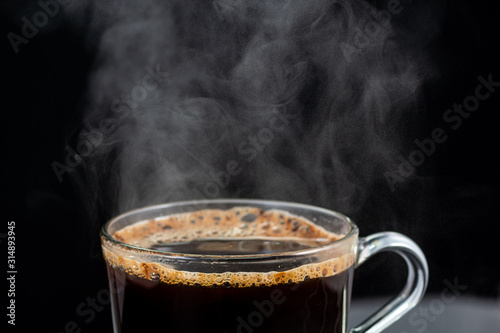 making instant coffee in a mug on a black background