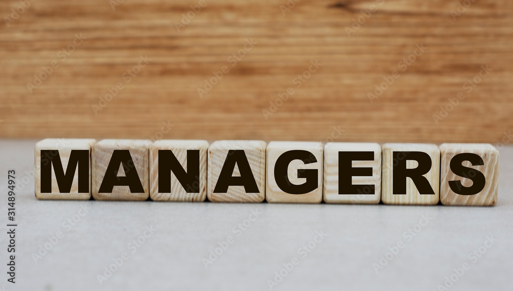 word menenger on cubes on a wooden background word menenger on cubes on a wooden background