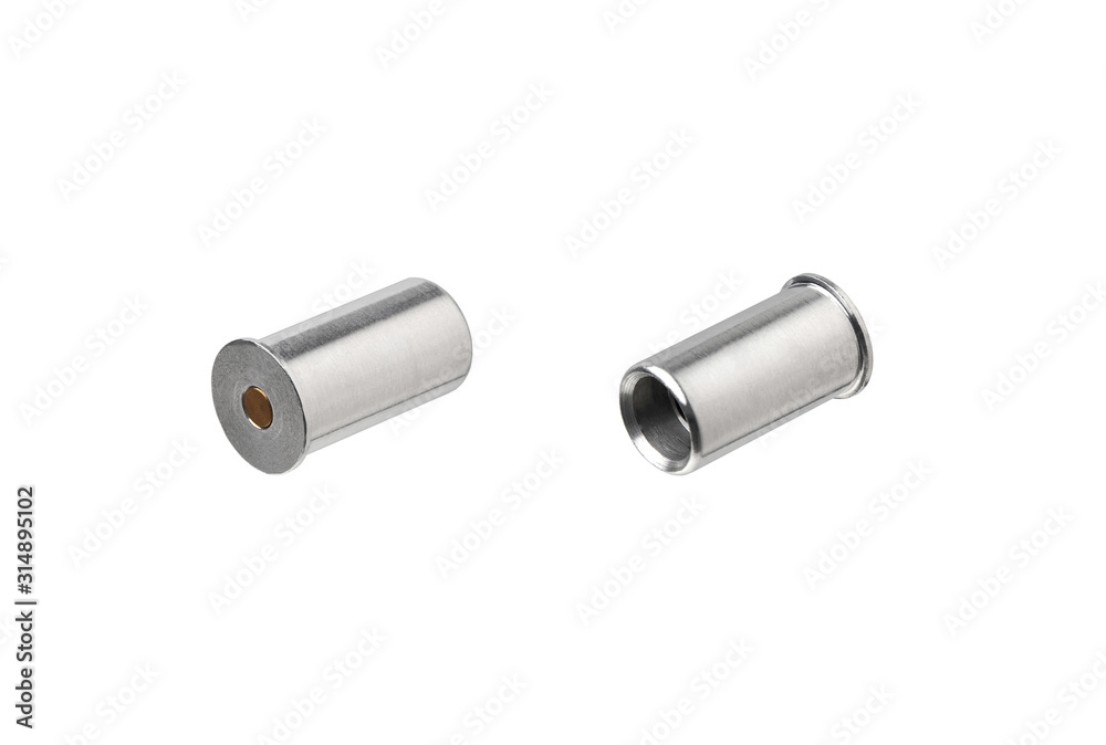 False ammo for idle double-barreled shotgun shutter. Metal cylinders isolate on a white background. False ammo for idle double-barreled shotgun shutter. Metal cylinders isolate on a white background.