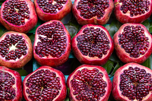 Tasty red pomegranates, close up. 