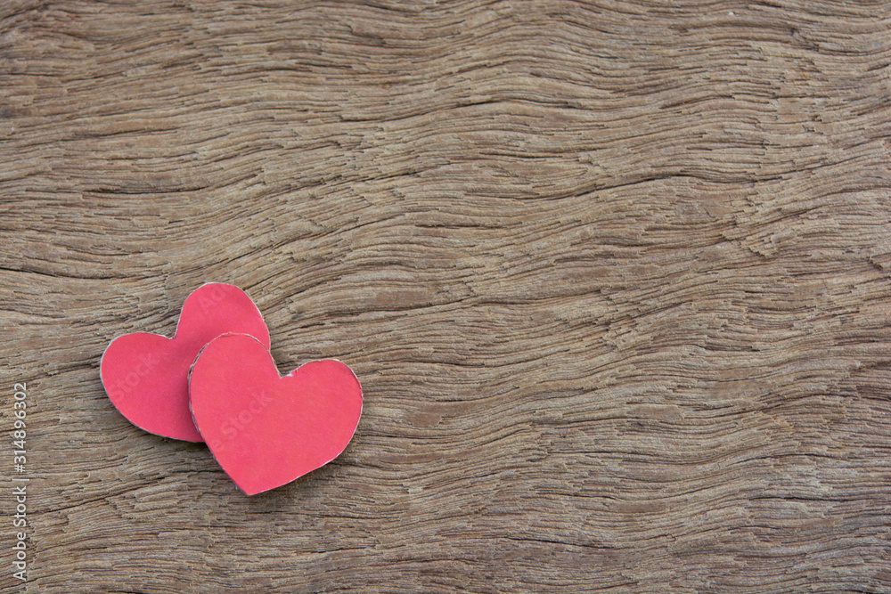 Valentines Day background with red heart shape on dark wooden background with copy space. Valentines Day background with red heart shape on dark wooden background with copy space.