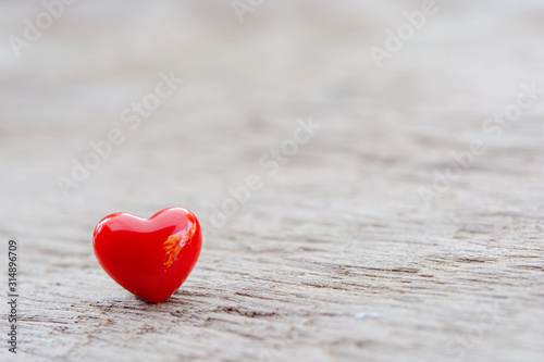 Valentines Day background with red hearts on plank wooden, copy space. photo