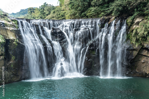 Fototapeta Naklejka Na Ścianę i Meble -  Shihfen Waterfall, Fifteen meters tall and 30 meters wide, It is the largest curtain-type waterfall in Taiwan