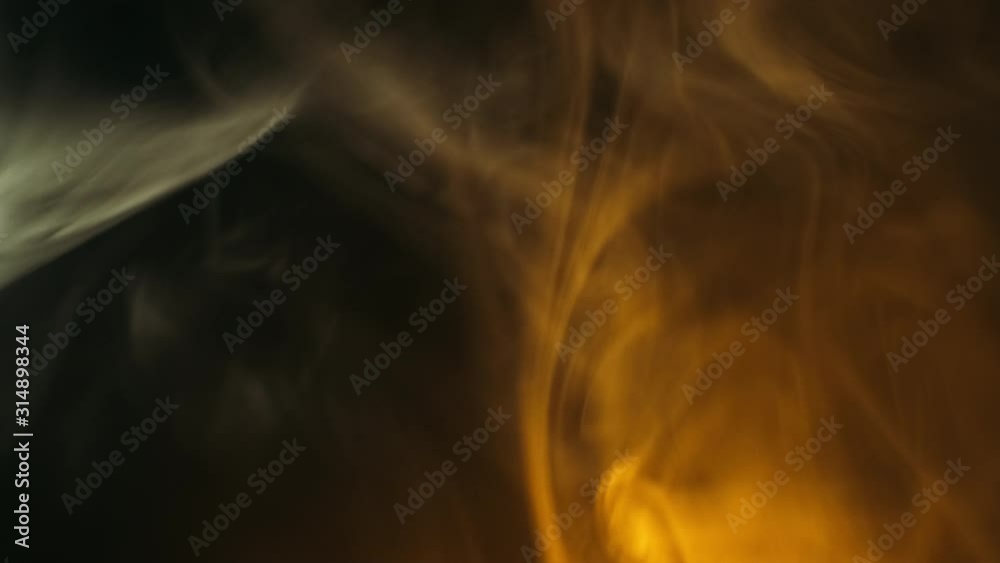 Abstract Forms Of Smoke On Black Background.