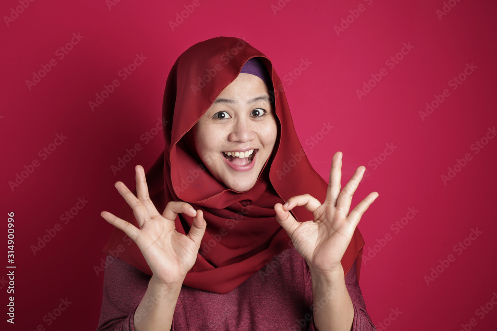 Muslim Woman Shows OK Sign Gesture Muslim Woman Shows OK Sign Gesture