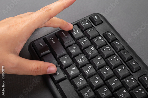 female hand on keyboard