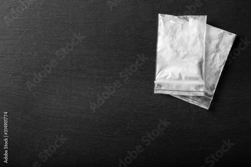 drug powder on a black background © alexshyripa
