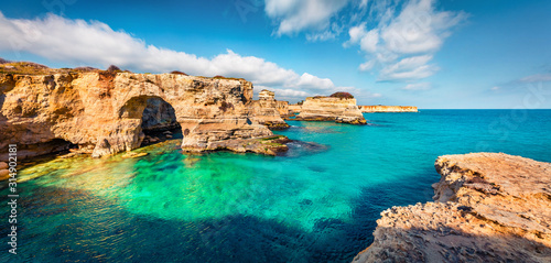 Panoramic spring view of popular tourist attraction - Torre Sant'Andrea. Sunny morning seascape of Adriatic sea, Torre Sant'Andrea village location, Apulia region, Italy, Europe.