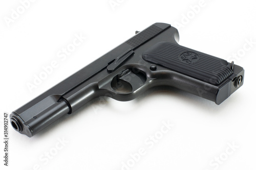 Black pistol of the USSR. Gun military forces of the Russian army. White background. © Sergei