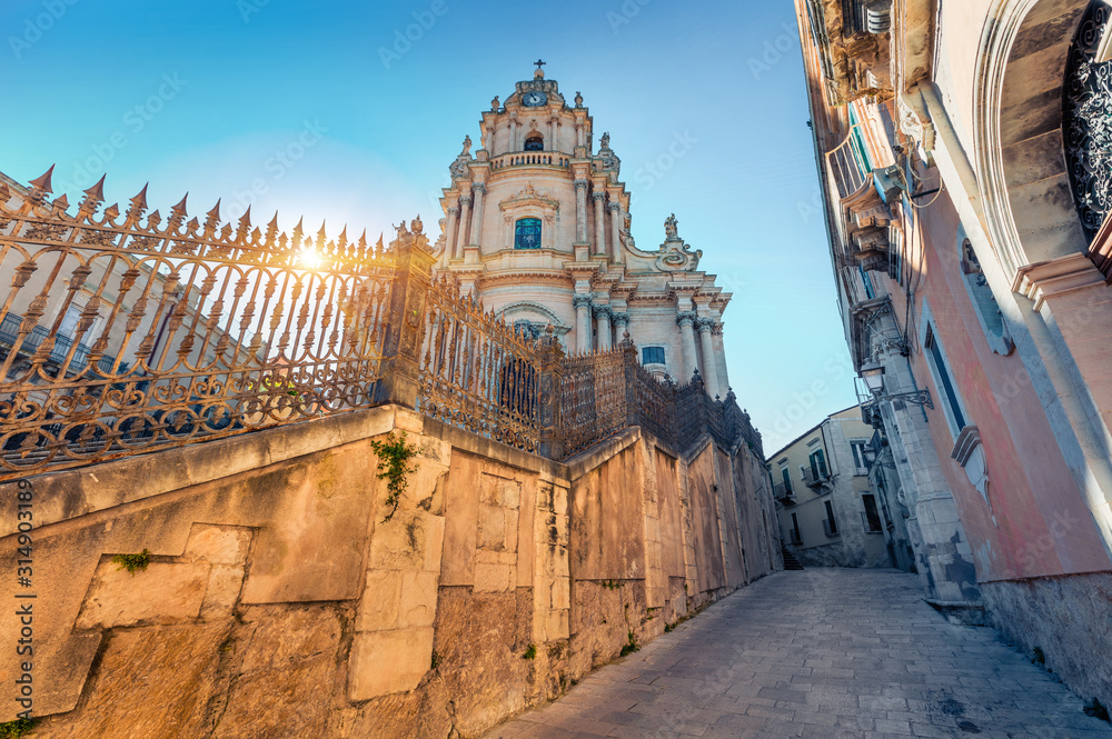 Picturesque spring scene of Piazza Duomo with  Duomo San Giorgio - baroque Catholic church. Splendid morning cityscape of Ragusa, Sicily, Italy, Europe. Traveling concept background.