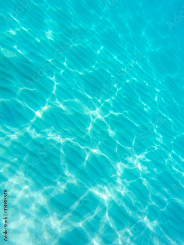 Underwater photo of ocean sandy floor