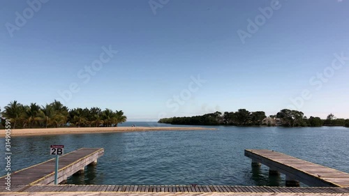 Harbor shot with a wooden ramp for passengers in a Caribbean island