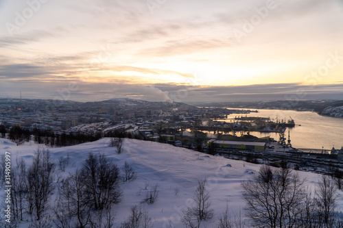 Winter views of the city and the Kola Bay from high hills in the vicinity of Murmansk. © yurisuslov
