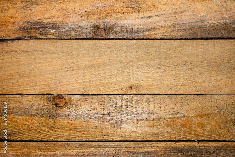 Texture made of wooden planks arranged horizontally, visible connection between boards.