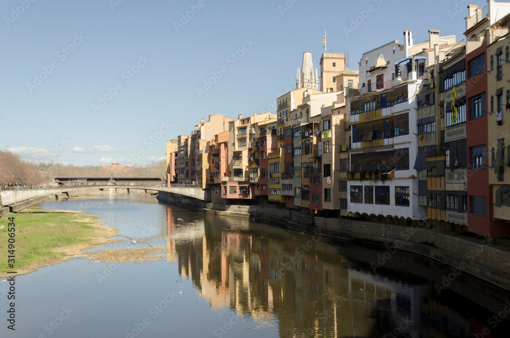 Colorful building next to Girona River