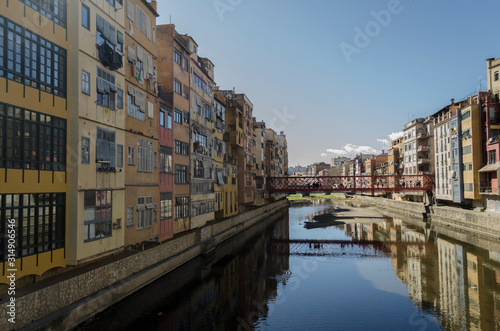 Famous Red bridge: Pont de Ferro that crosses Oñar River at Girona City Centre