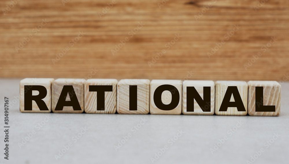 concept of the word rational on cubes on a wooden background concept of the word rational on cubes on a wooden background