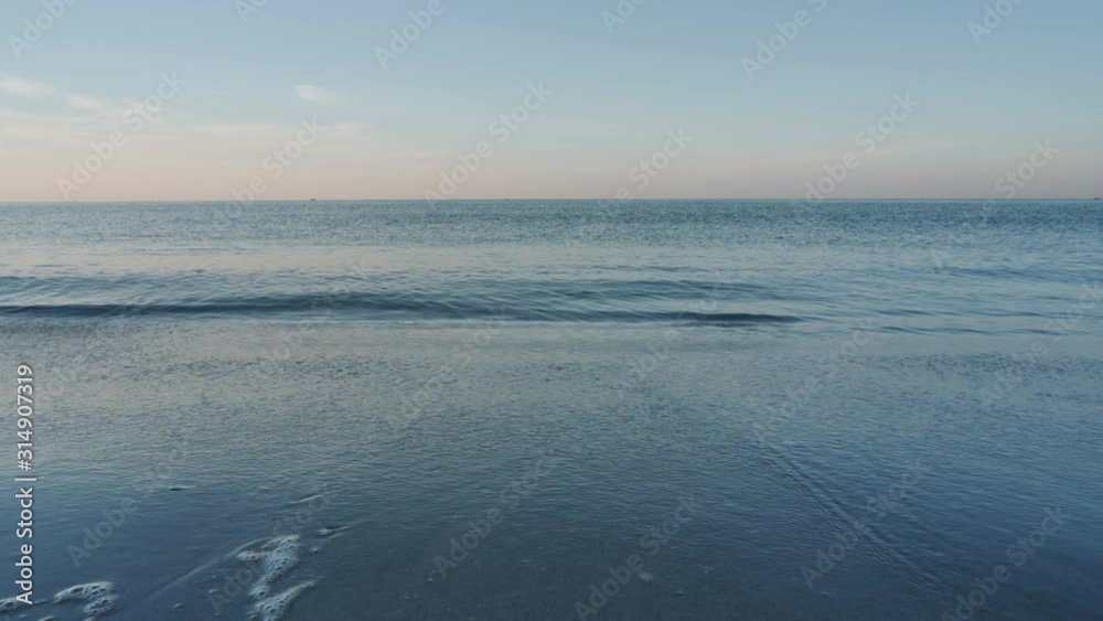 Background sea and beach with a brilliant blue sky In the morning Thailand Asia. Slow motion Background sea and beach with a brilliant blue sky In the morning Thailand Asia. Slow motion