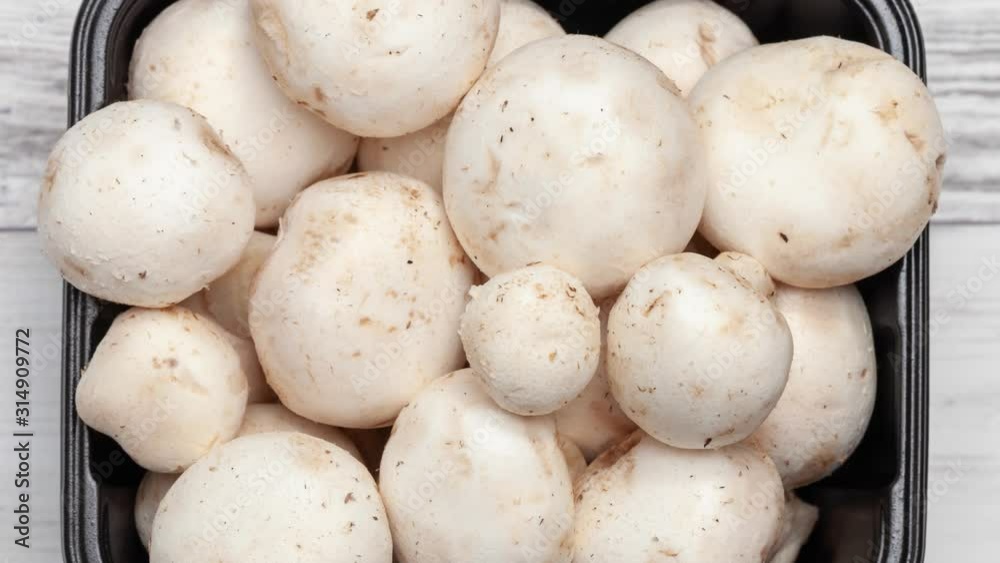fresh mushrooms on a wooden background fresh mushrooms on a wooden background