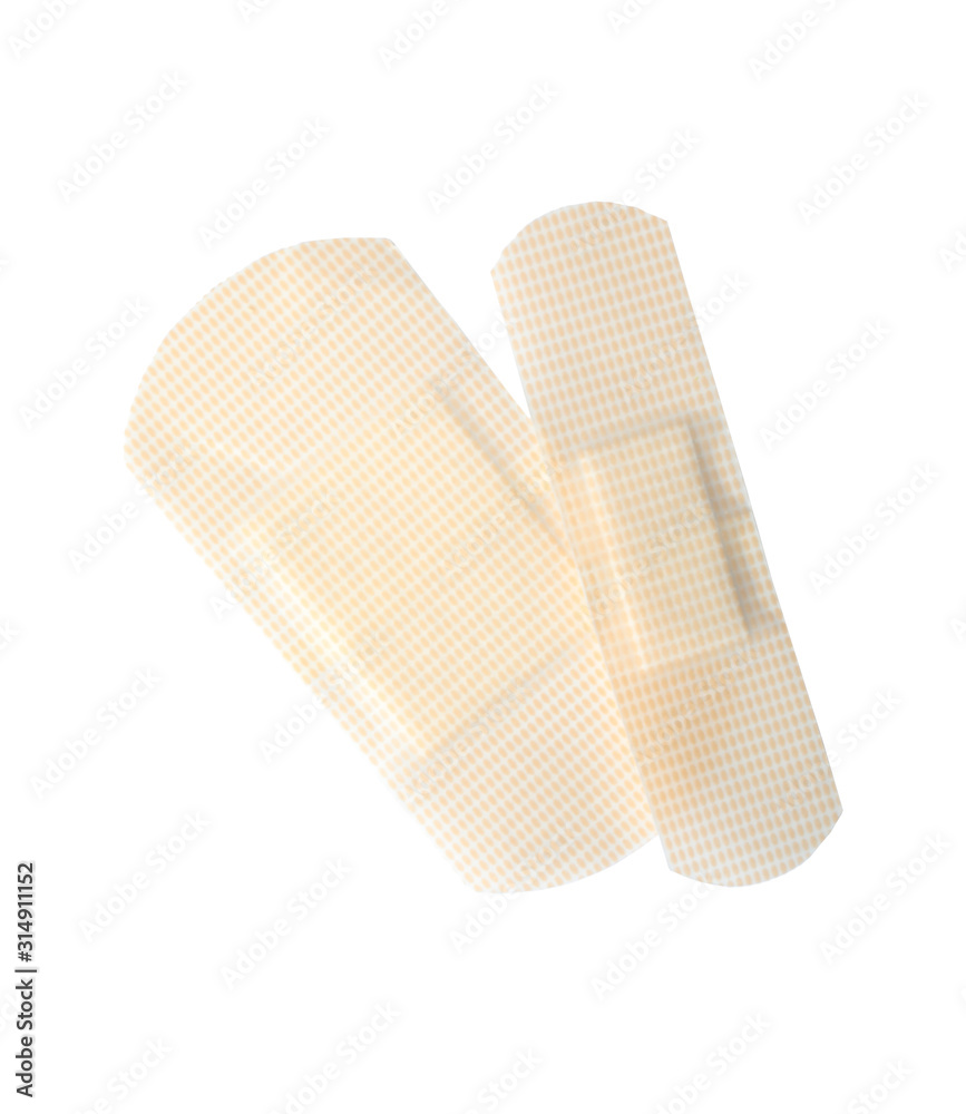 Medical sticking plasters isolated on white. First aid item Medical sticking plasters isolated on white. First aid item