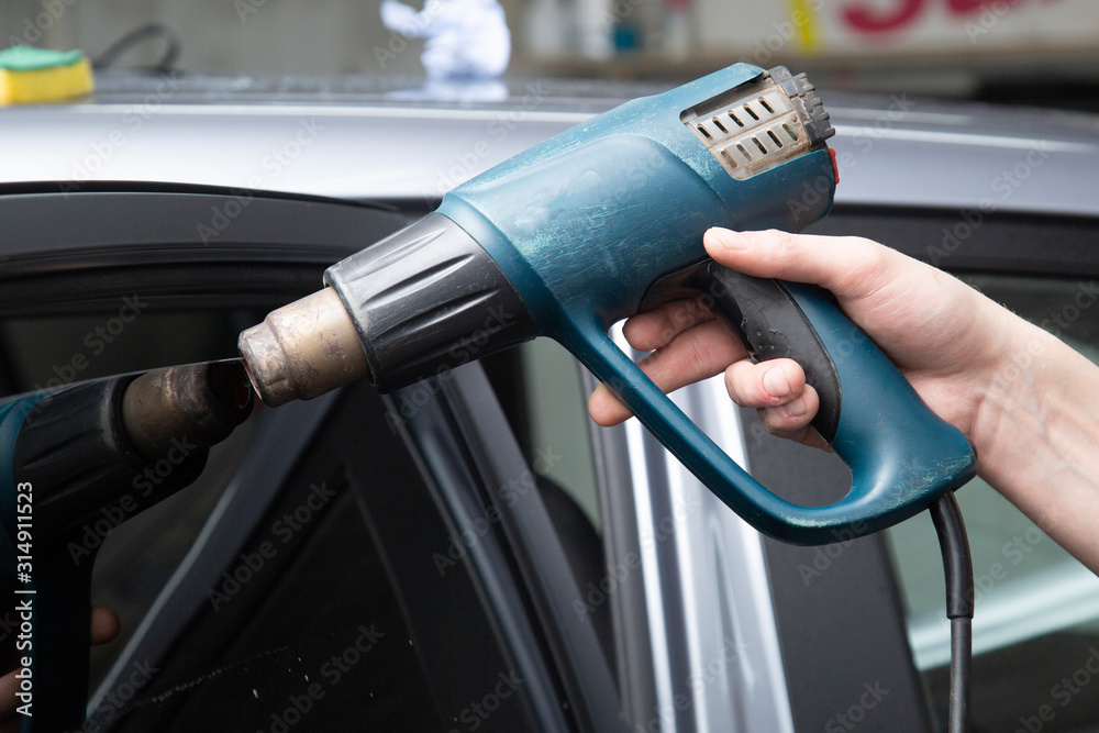 Installation of window film on car Windows. Protection from UV light. Installation of window film on car Windows. Protection from UV light.